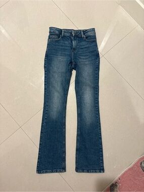 High-Rise Flare Jeans in Dark Blue Wash